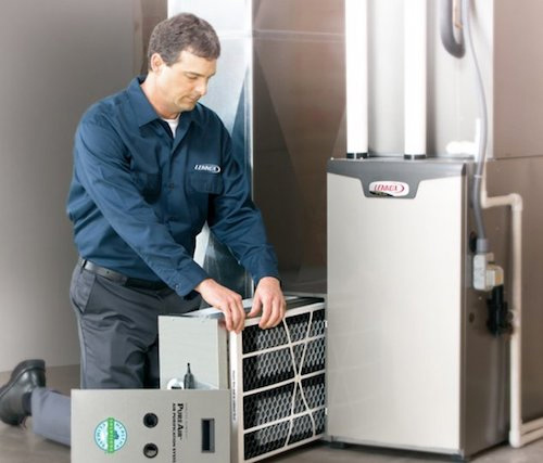 Denver HVAC Technician repairing furnace