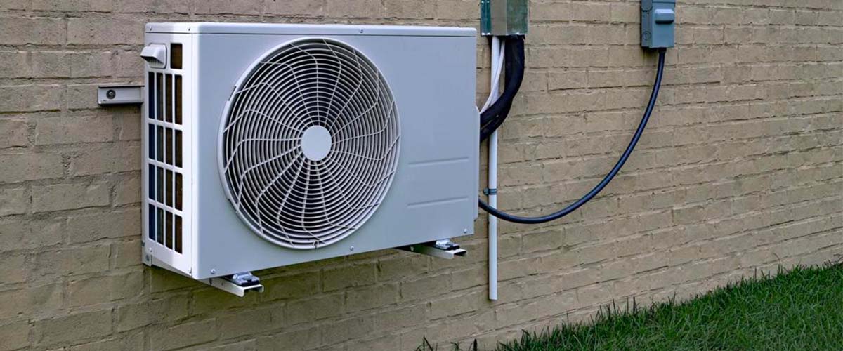 ductless AC unit wall outside denver home