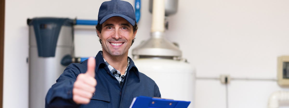 How Do Hot Water Heaters Work? 2 How Do Hot Water Heaters Work? smiling technician servicing hot water heater